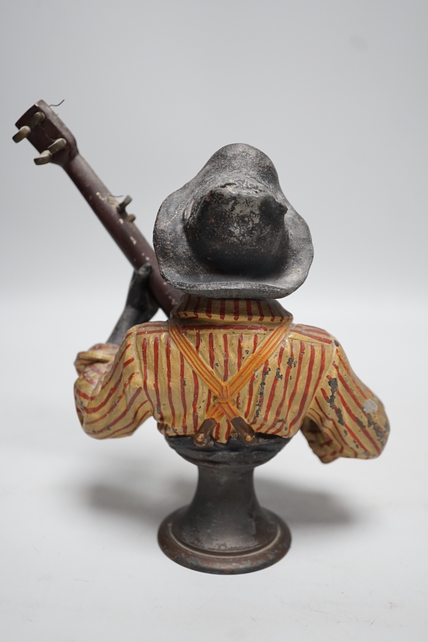 After Emile Coriolan Guillemin (1841-1907). A cold painted spelter model, ‘’The Banjo Player’’, 20cm